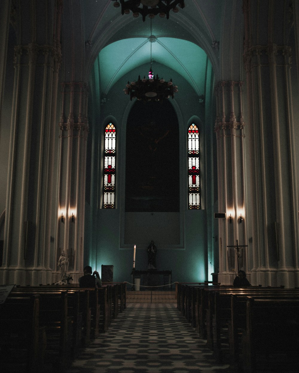 two persons inside chapel