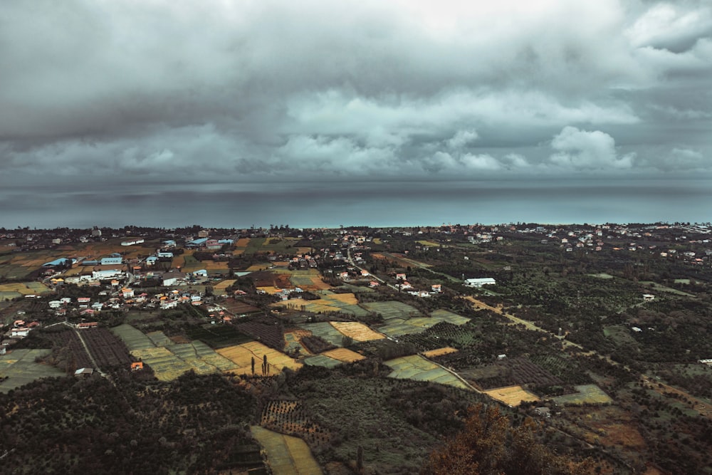 aerial view of houses during cloudy day