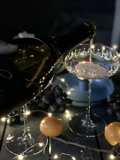 Close-up of premium Valdobbiadene prosecco being poured into crystal flutes against a backdrop of luxury ambiance