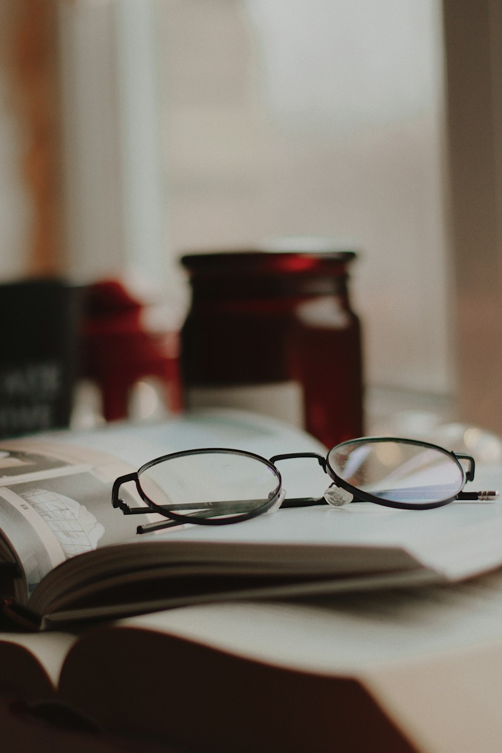 selective focus photography of gray framed eyeglasses