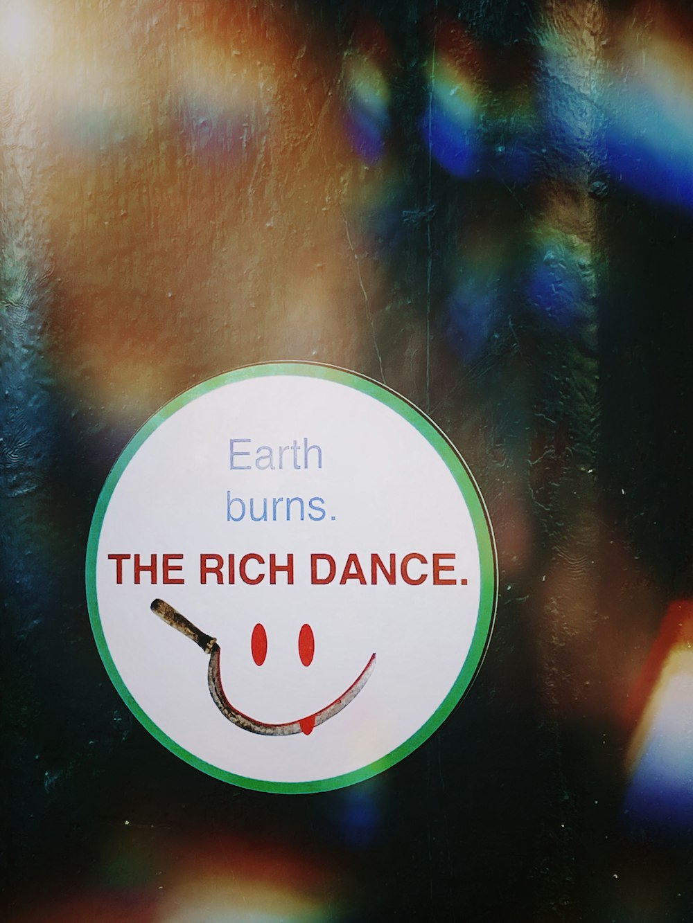 Earth Burns The Rich Dance labeled sticker
