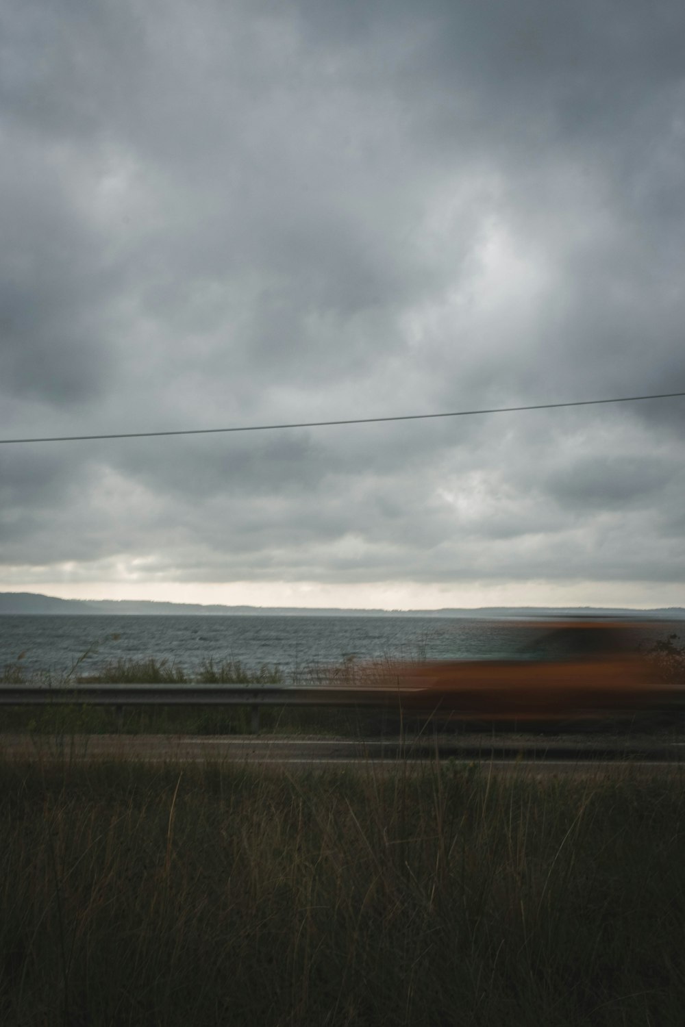 coastal road under dark skies