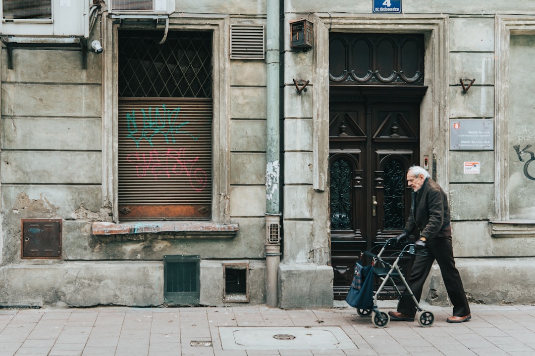 man walking with rollator