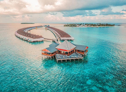 aerial photography of resort rooms and island