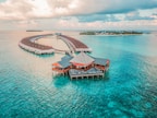 aerial photography of resort rooms and island