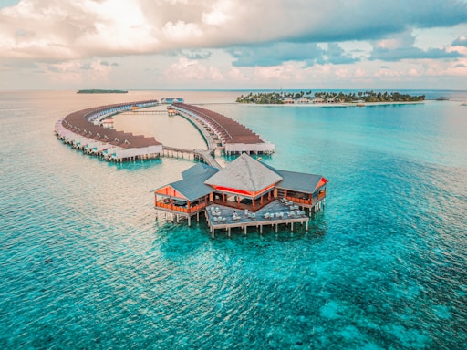 aerial photography of resort rooms and island