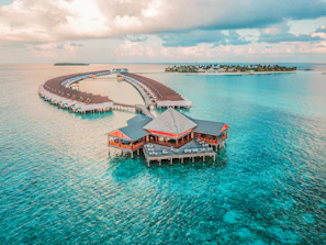 aerial photography of resort rooms and island
