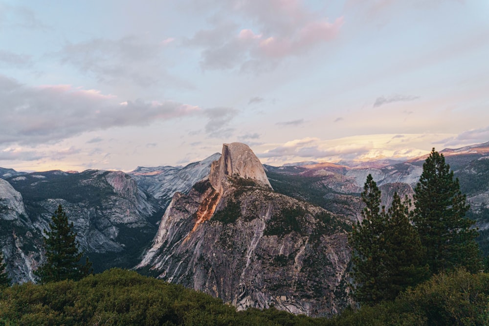 Yosemite National Park, Half Dome under blue and white sky