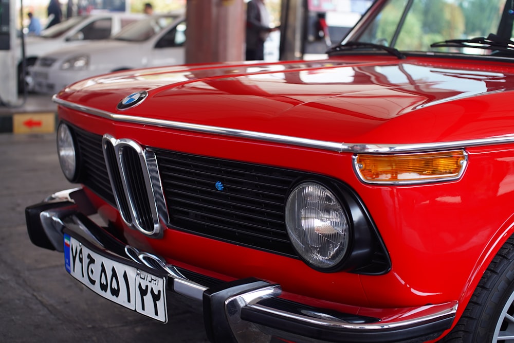 red BMW New Class vehicle