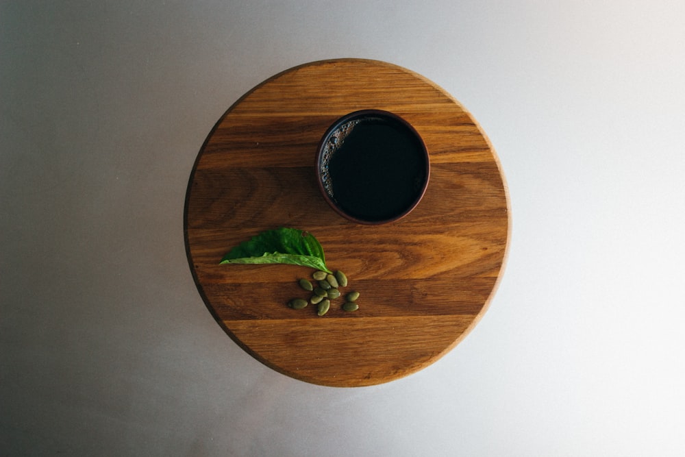 black bowl on brown surface