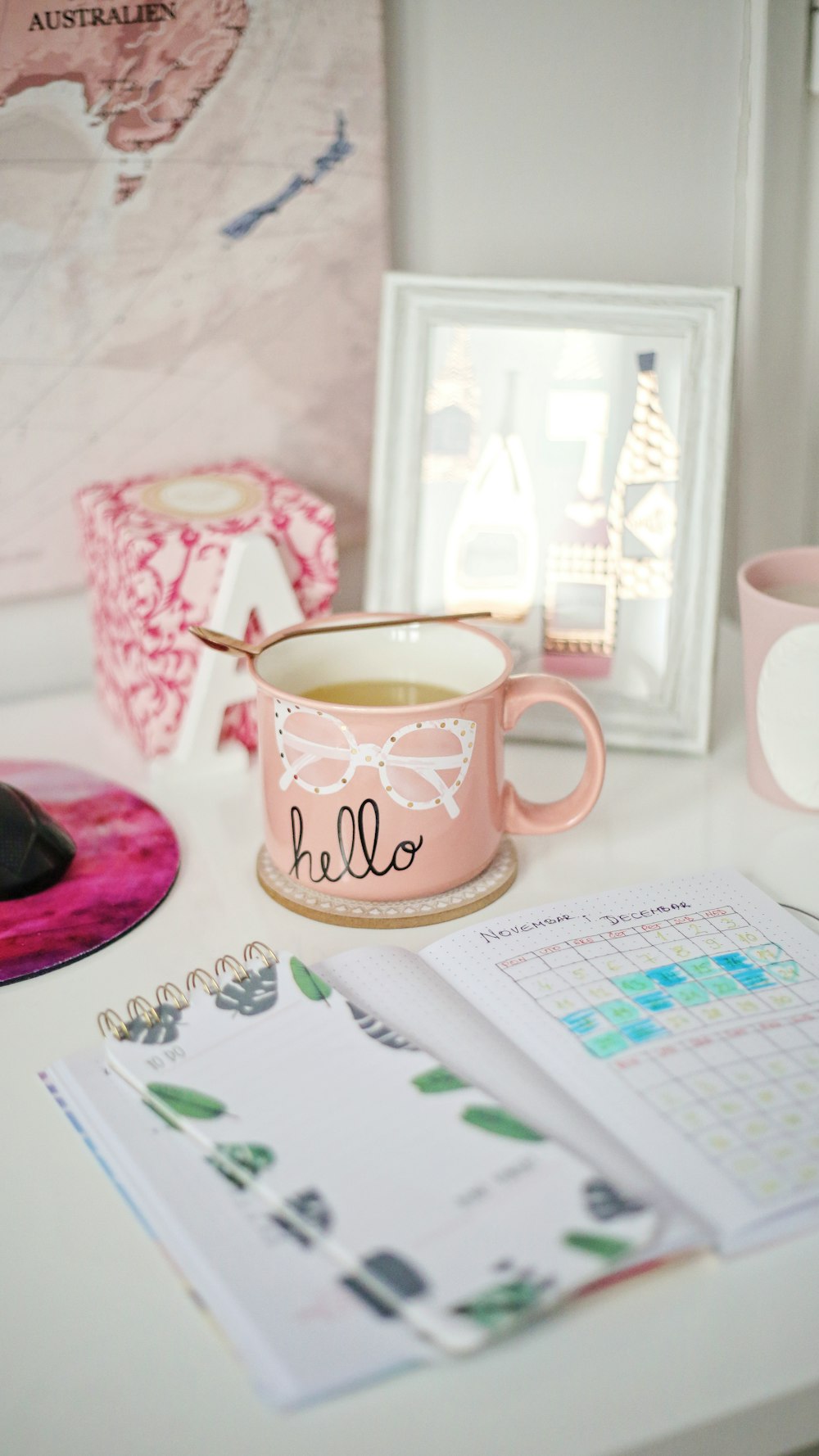 pink and white Hello ceramic mug