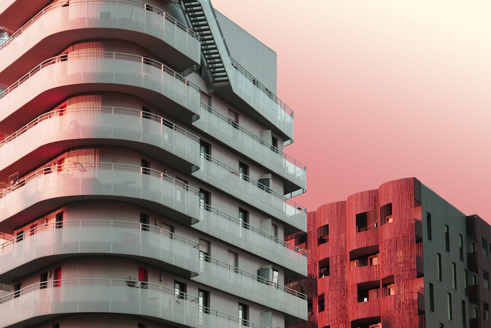 architectural photography of beige and red city buildings