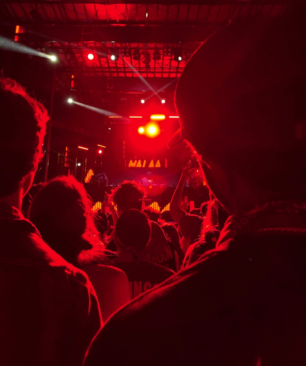 crowd inside building with party lights