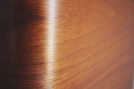 a close up of a wood grained surface