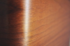 a close up of a wood grained surface