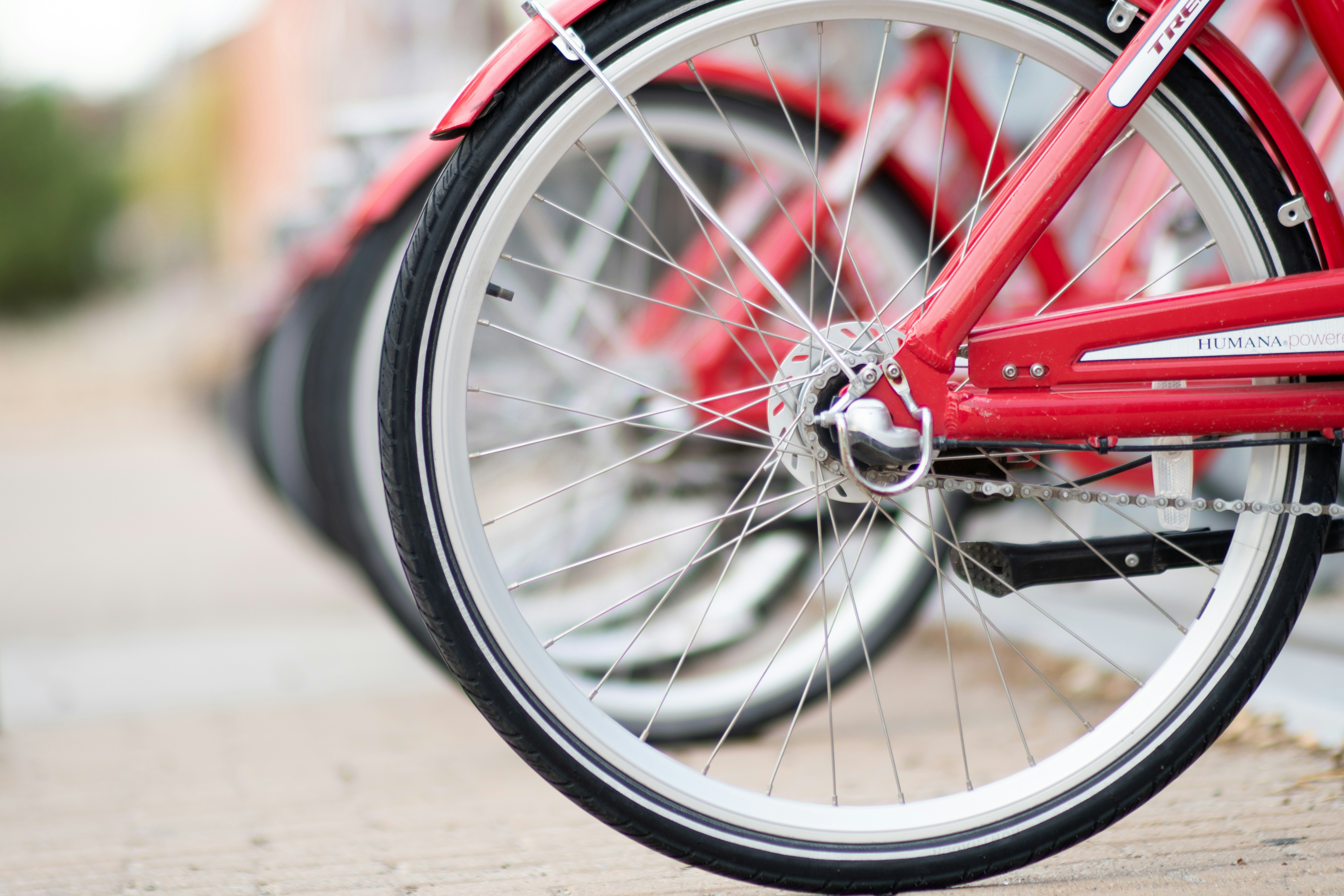 selective focus angle photography of bicycles in a parking lot