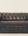 brown leather Chesterfield sofa