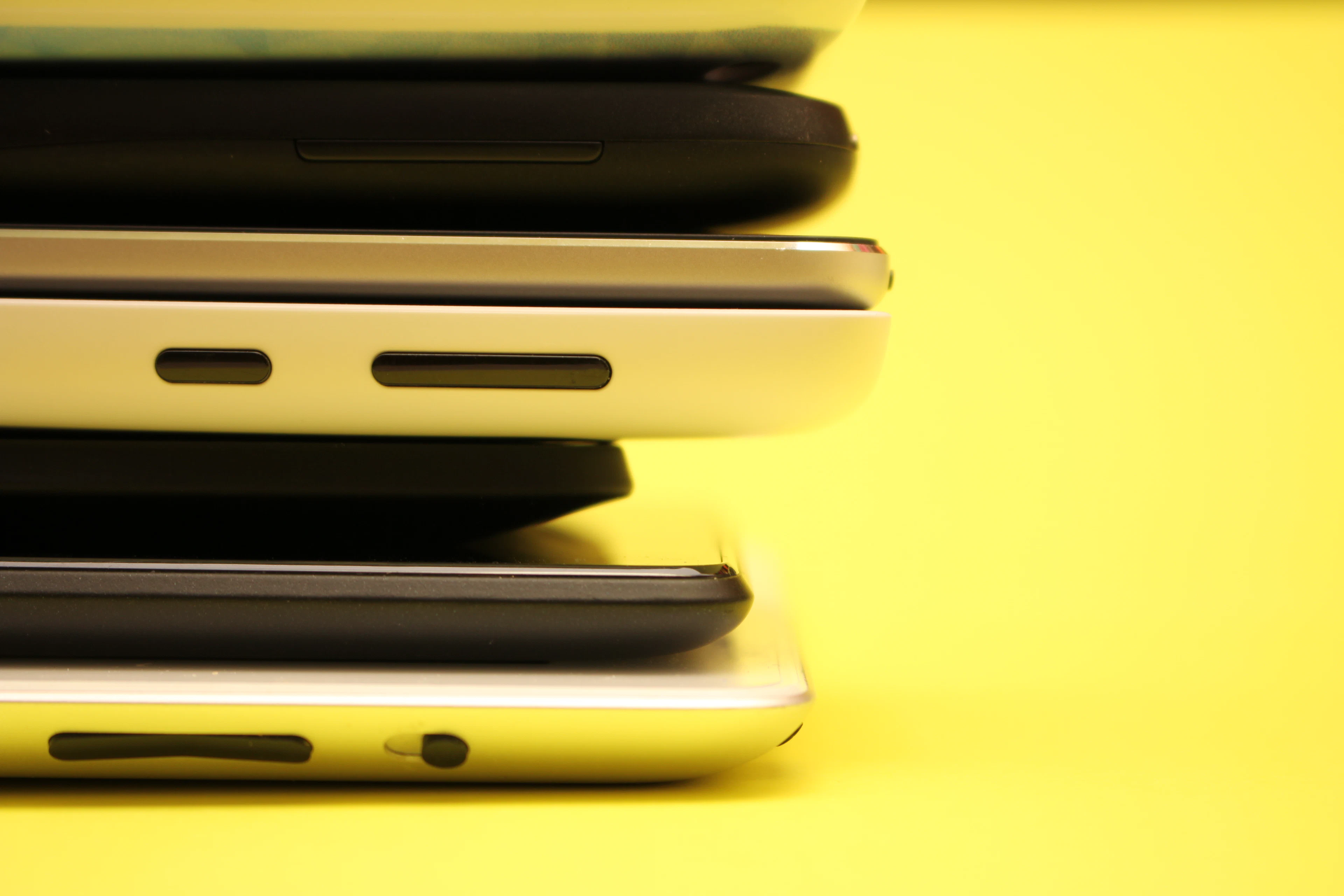 A stack of closed laptops