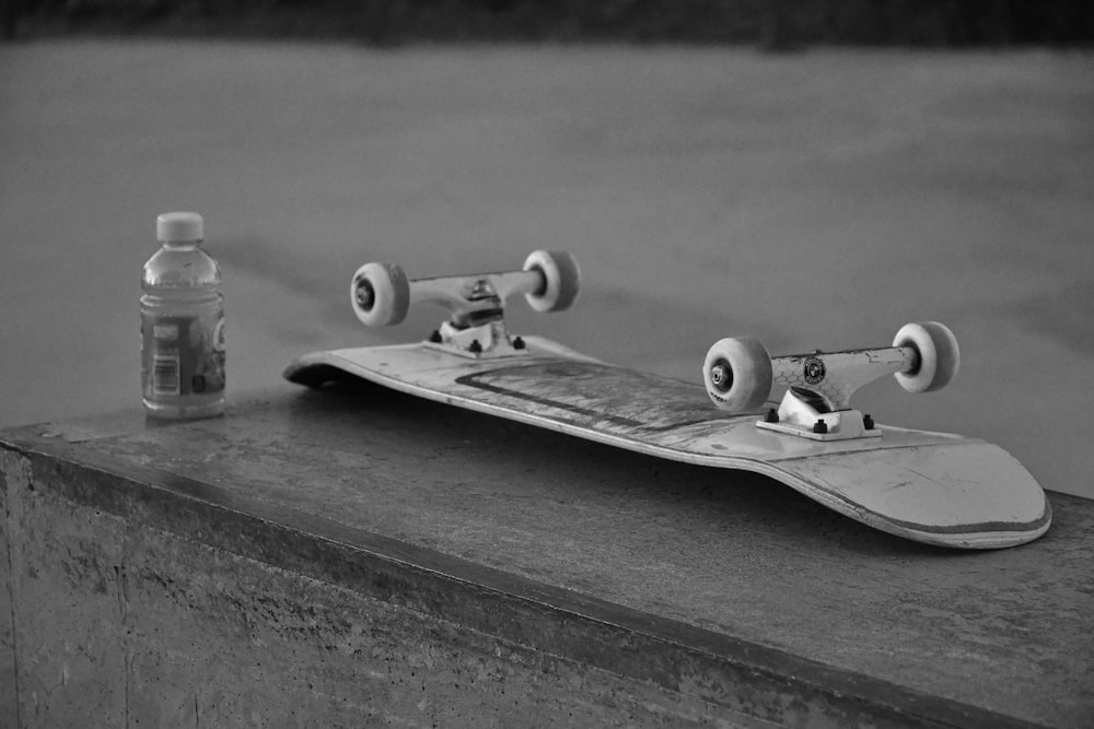 grayscale photography of skateboard