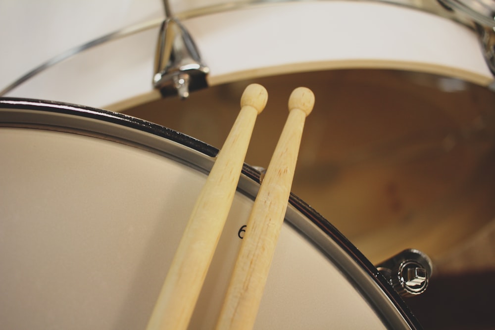 two beige drum sticks