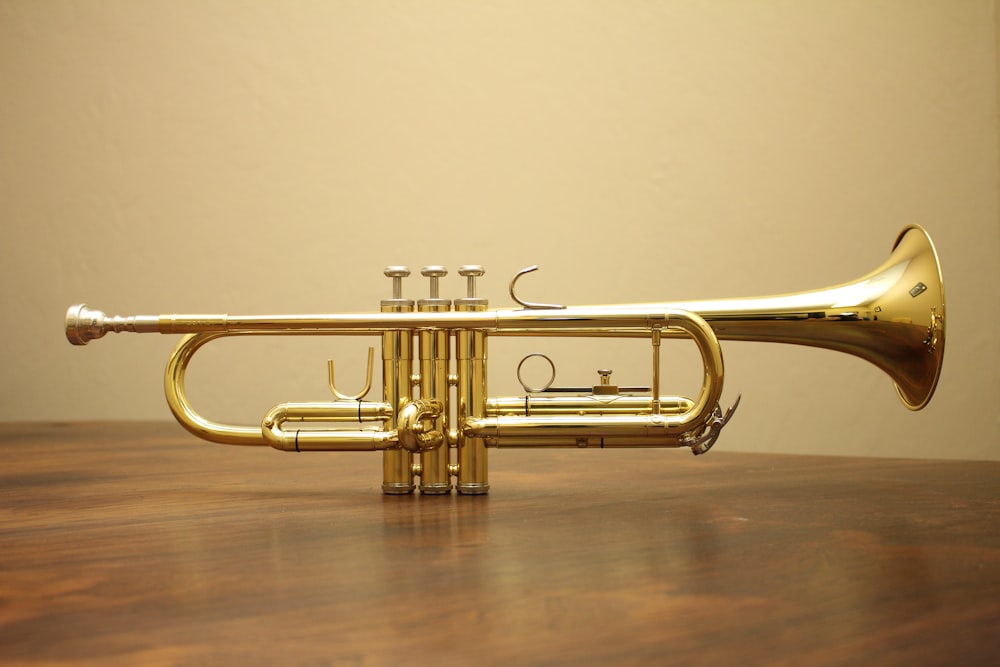 brass-colored trumpet