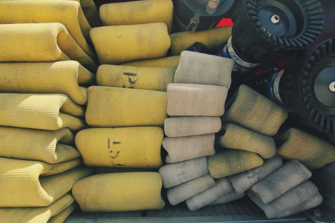 shallow focus photo of yellow and white textiles