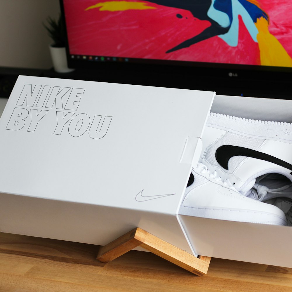 white Nike Air Max shoes in box
