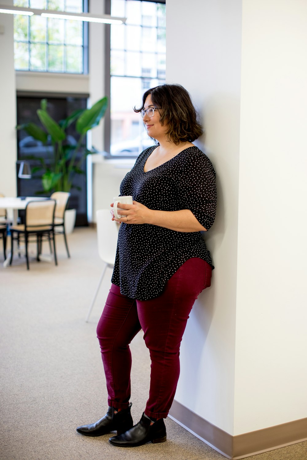 shallow focus photo of woman in black T-shirt