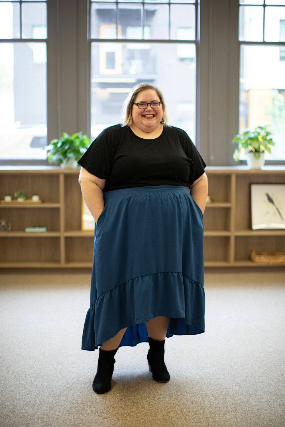 smiling woman wearing eyeglasses