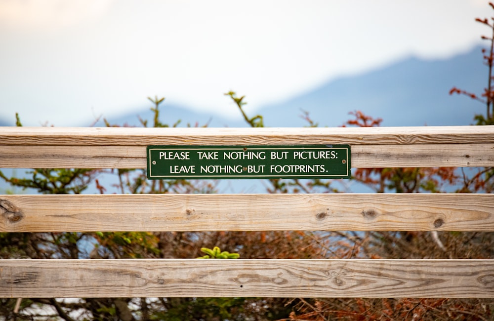 shallow focus photo of green signage