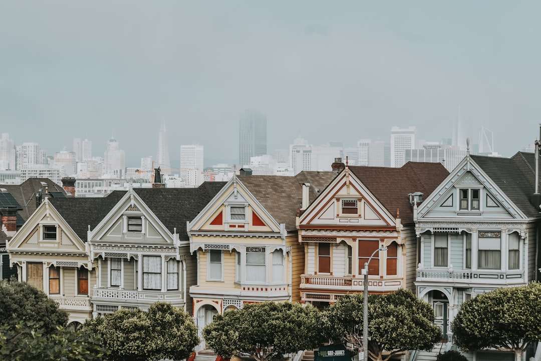 green trees beside buildings, The Painted Ladies