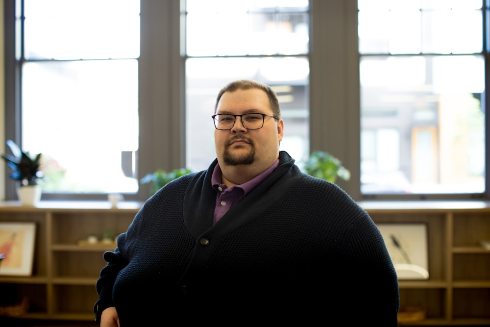 man in black cardigan