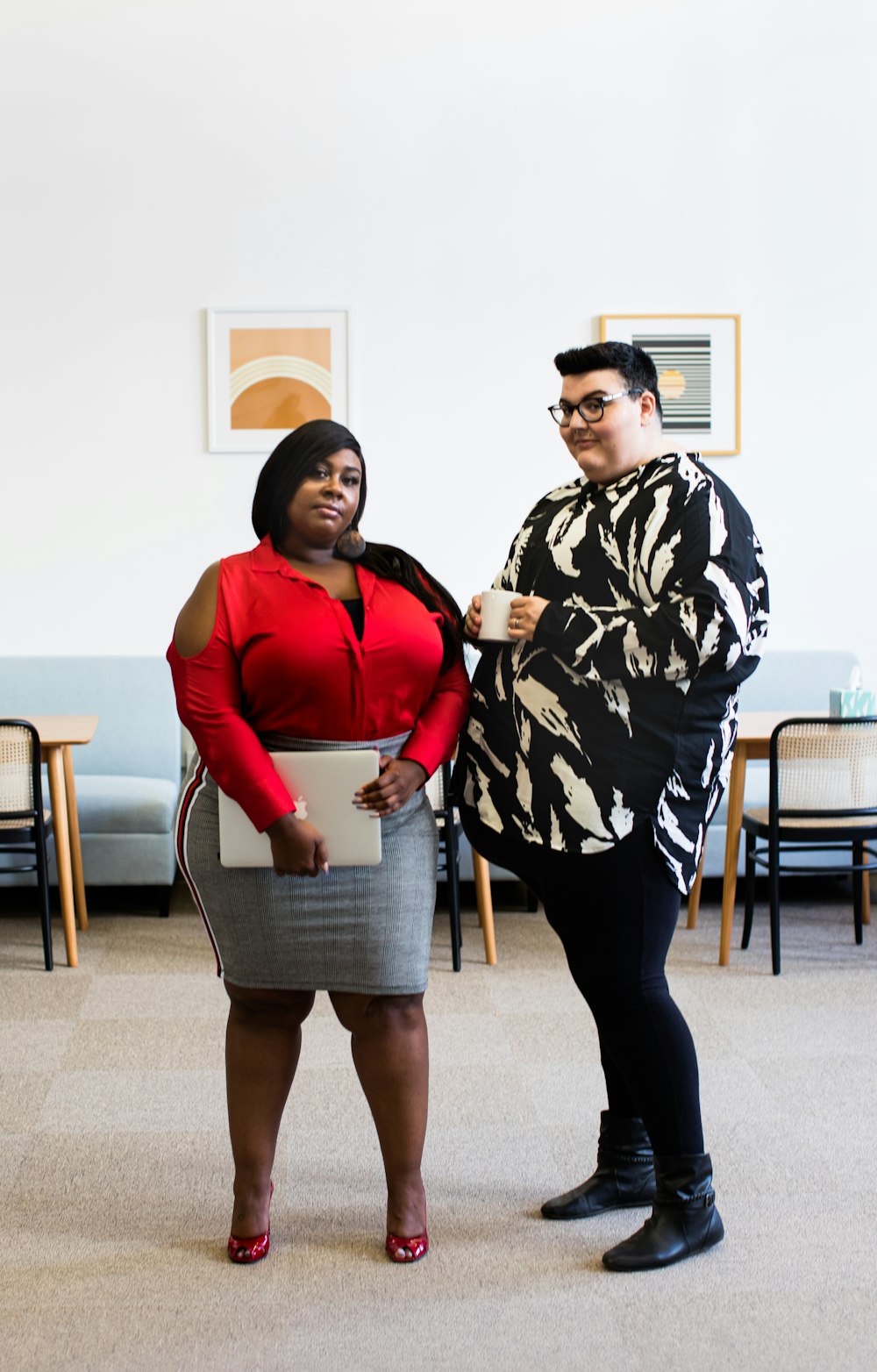 man standing beside woman