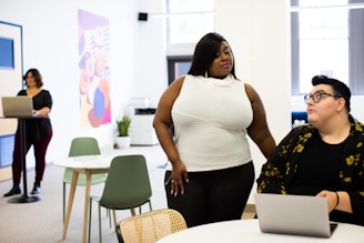 A close-up of an agent interacting with clients in a modern office setting.