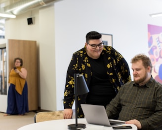 man using laptop on desk