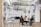 A group of diverse people discussing service options in a modern office.