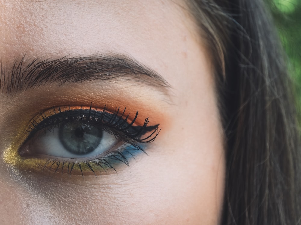 woman with red and yellow eyeshadow