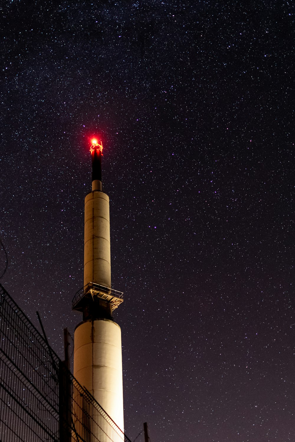 close-up photography of tower during nighttime