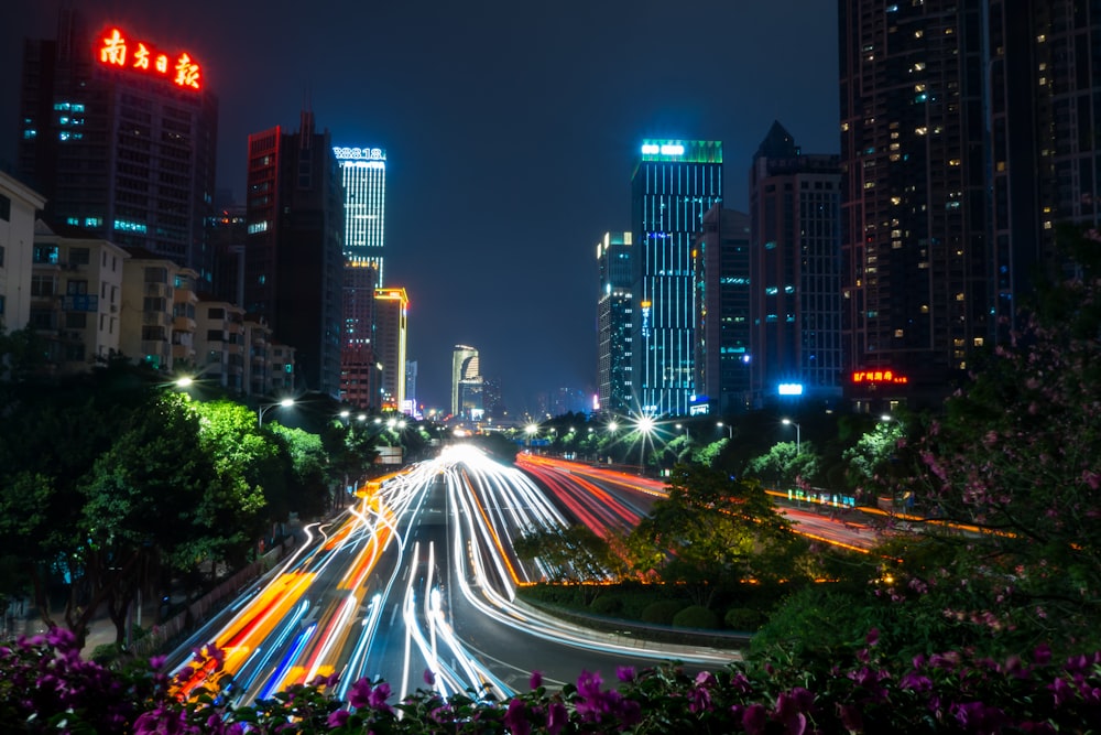 lighted cityscape in timelapse photo