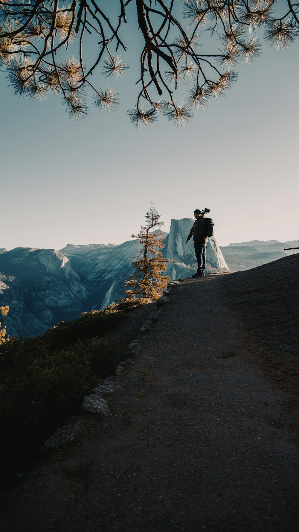 man standing on mountain