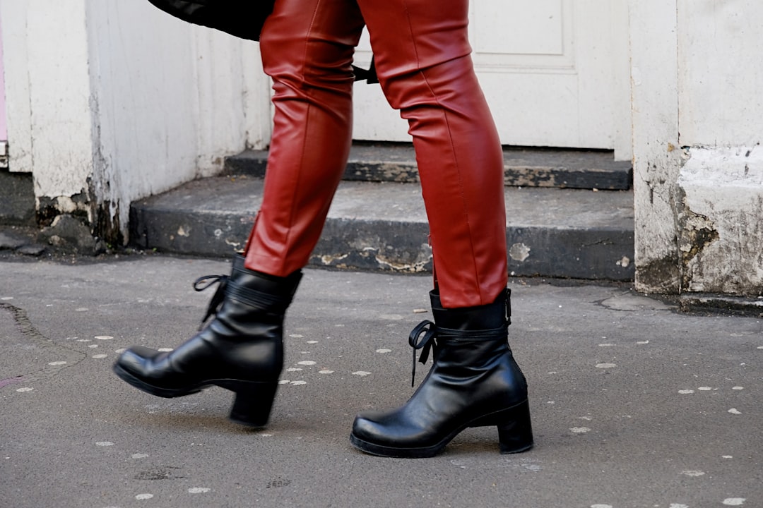 pair of black leather boots