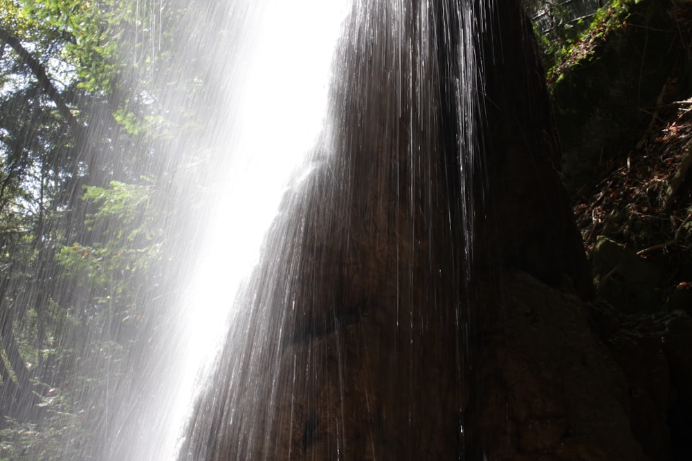 time lapse photography of waterfall