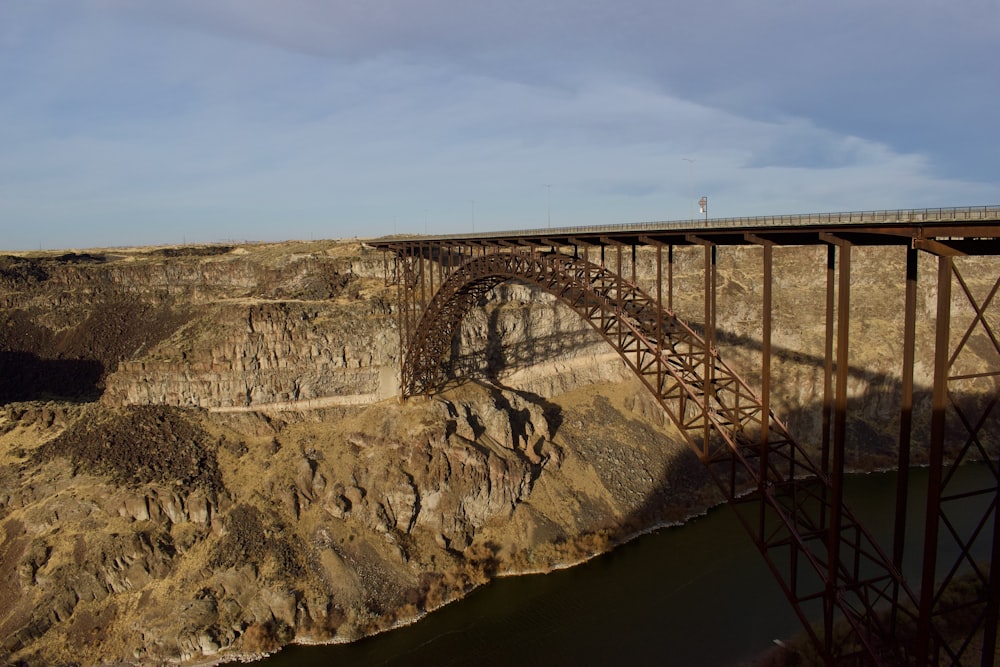 rusty bridge above dam