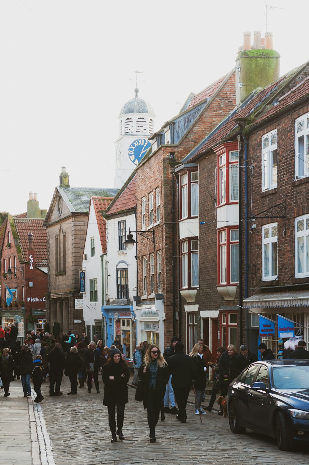 group of people walking on street