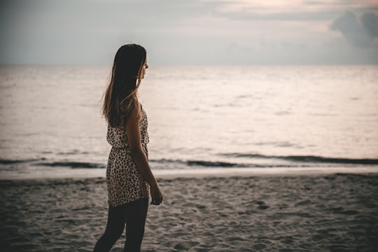 woman standing on seashore in Puerto Vallarta Mexico