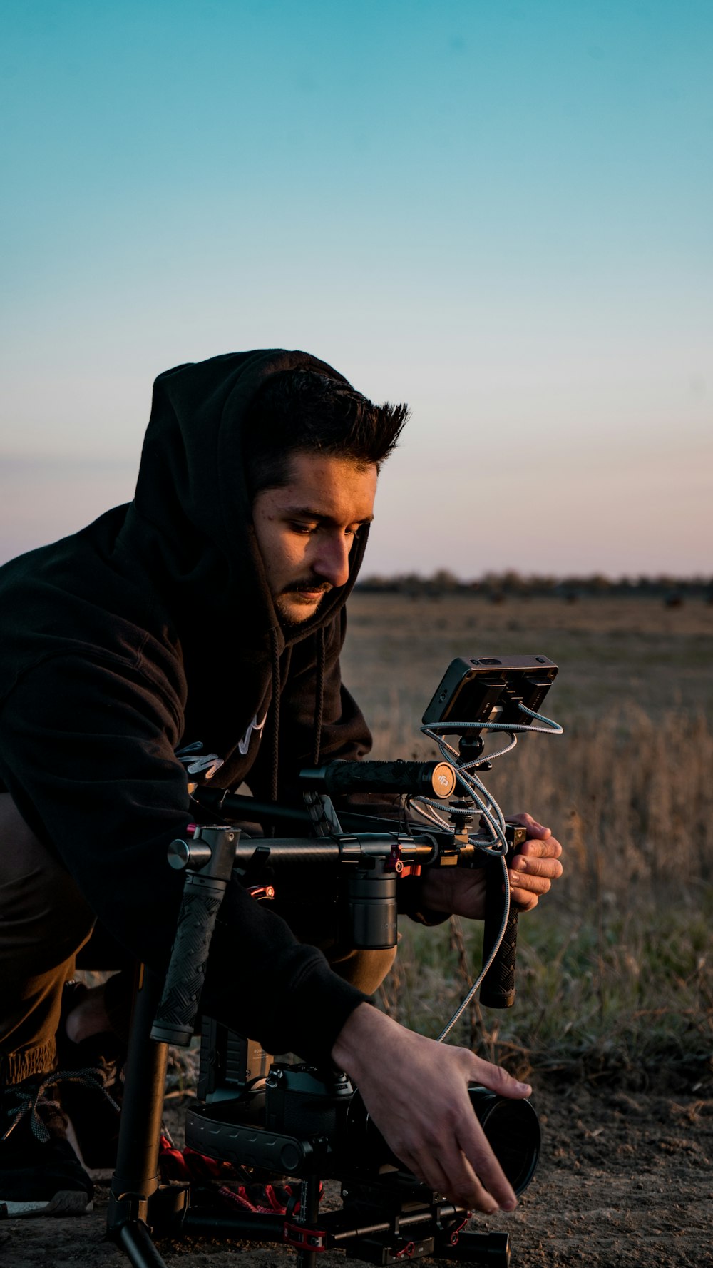 man holding gimbal