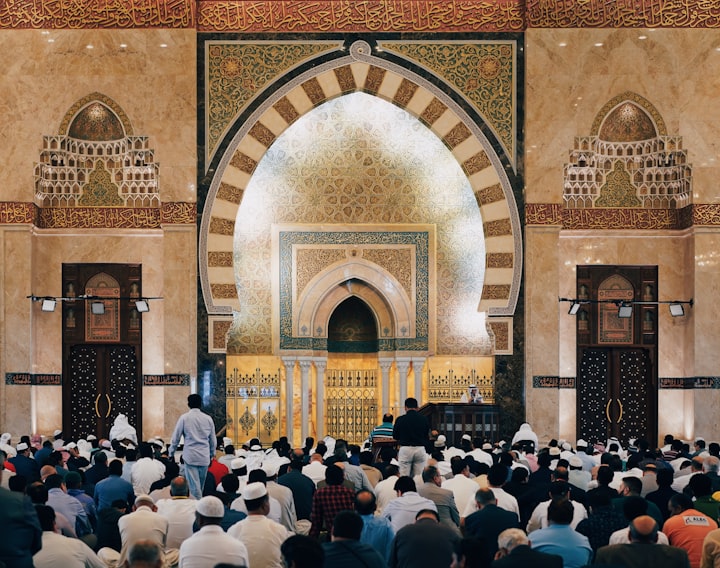 A photo of Muslims in a mosque