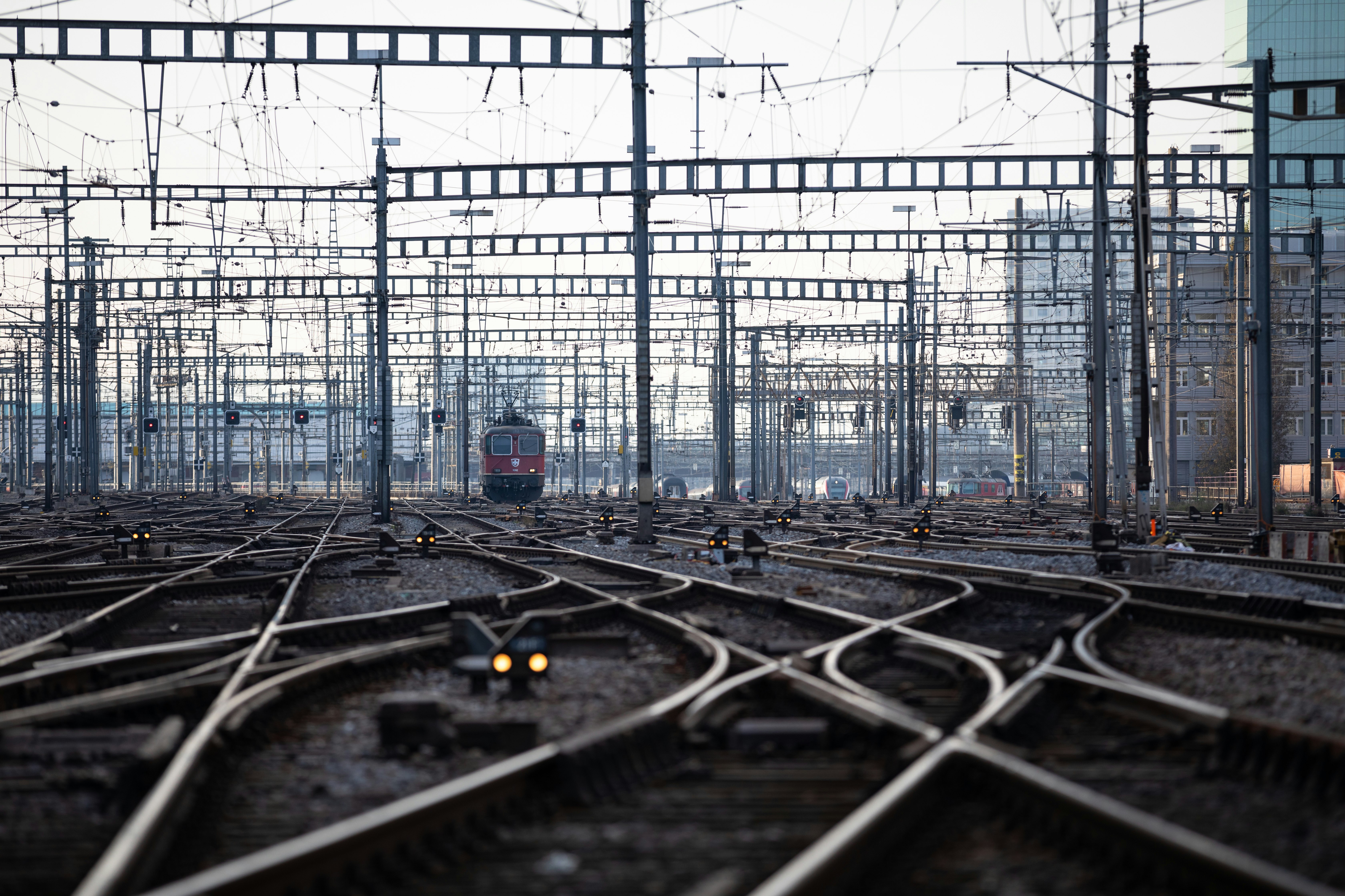 gray train railways during daytime