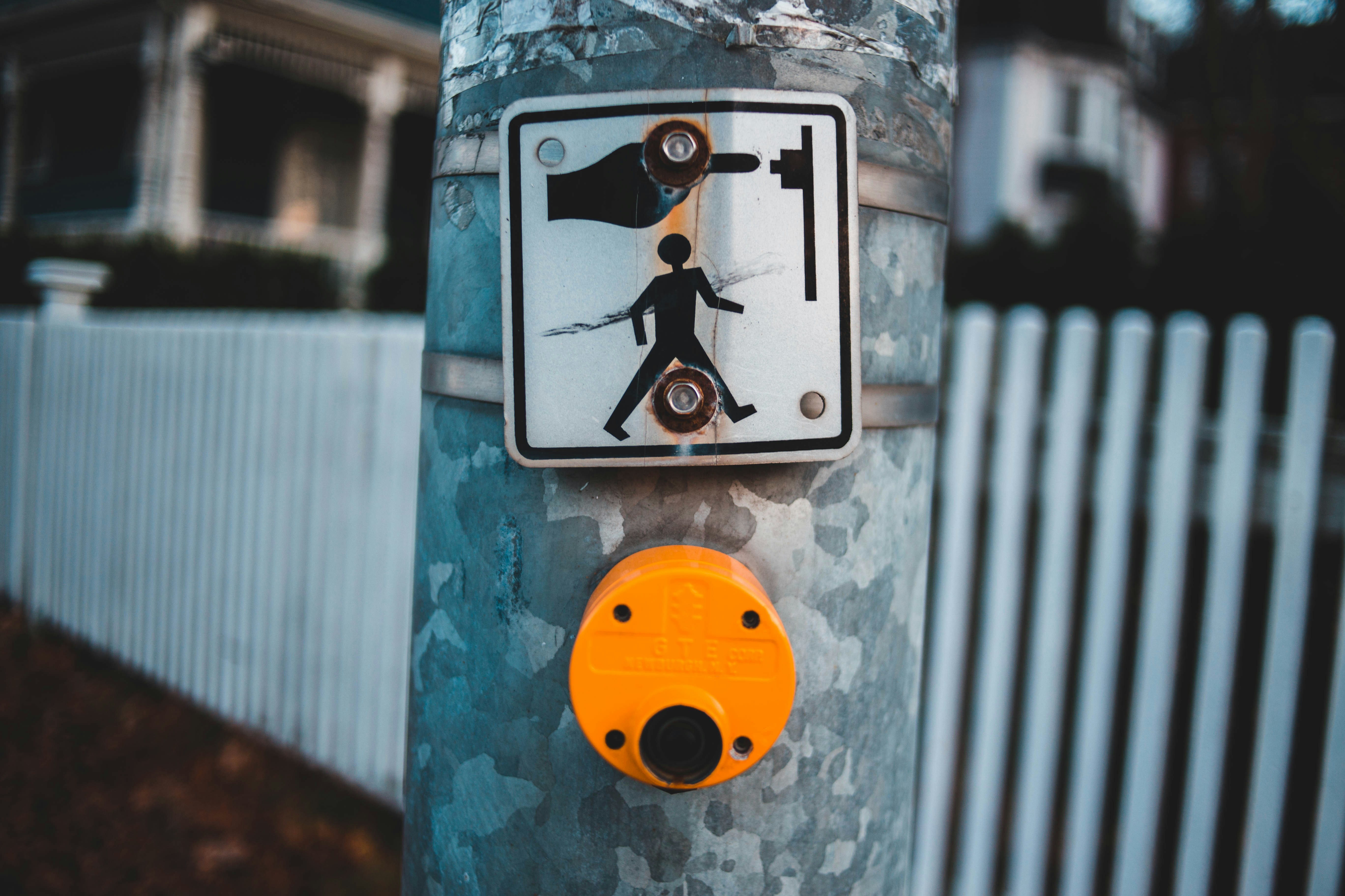 Gray and black pedestrian signage photo – Free Orange Image on Unsplash