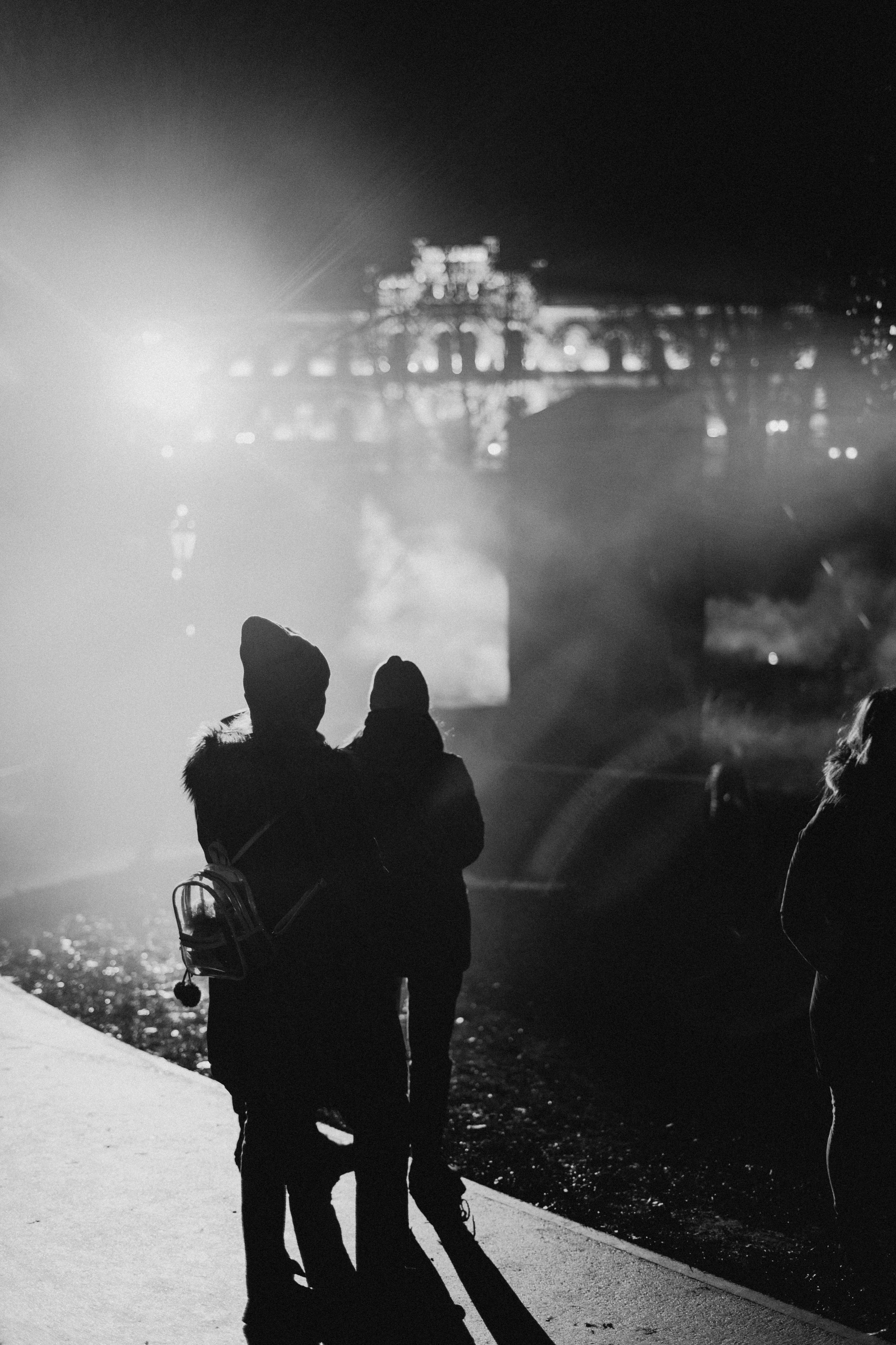 grayscale photography of persons on stage